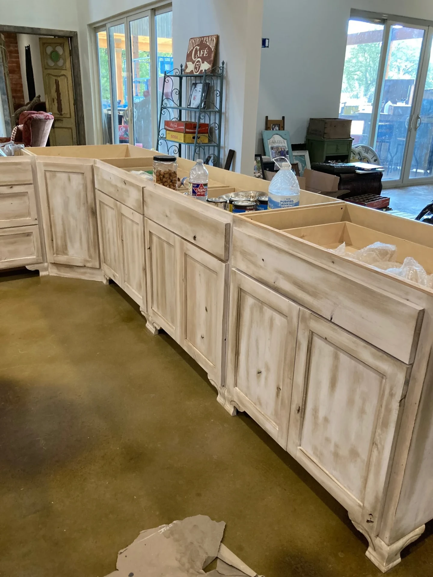 Custom whitewashed kitchen cabinetry in progress